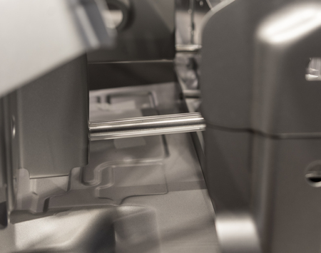 Metal parts of a car in automotive production .