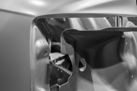 Metal parts of a car in automotive production .の写真素材