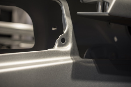 Metal parts of a car in automotive production .の写真素材