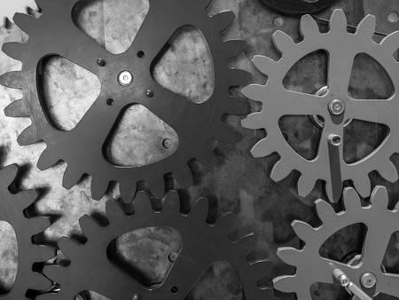 The gears of a mechanism on metal wall .の写真素材