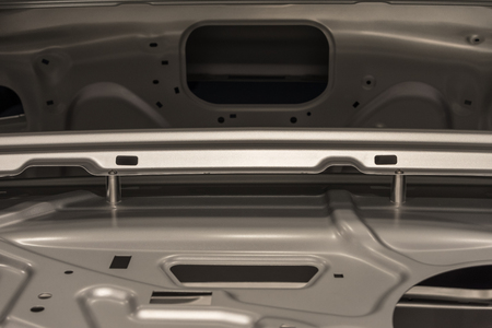 Metal parts of a car in automotive production .の写真素材