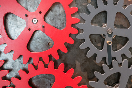 The gears of a mechanism on metal wall .の写真素材