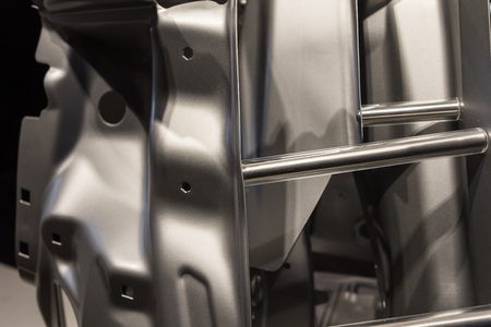 Metal parts of a car in automotive production .の写真素材