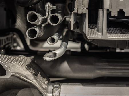 The pipes in a engine of modern car .の写真素材