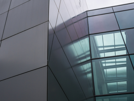 The glass architecture in city against a sky .の写真素材