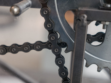 The old and vintage chain belt of a engine .の写真素材