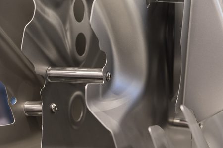 Metal parts of a car in automotive production .の写真素材
