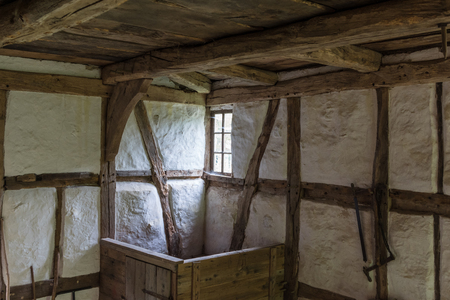 The window of an old farmhouse, inside .の写真素材