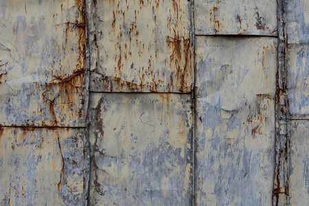 The old iron wall of a building .の写真素材