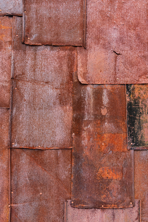The old iron wall of a building .の写真素材