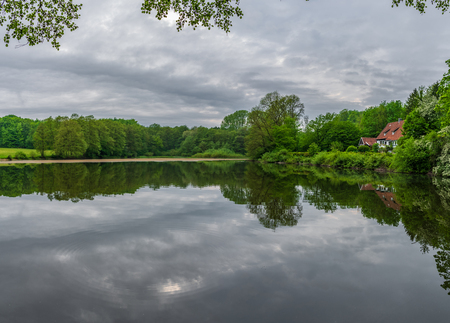 Pond  in Teutoburg Forest nearby Externsteine rocks, Germany .の写真素材