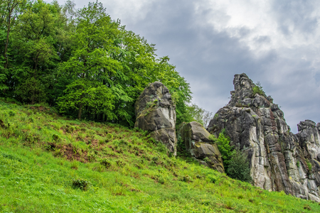 Sandstone rock formation Externsteine in Teutoburg Forest, Germany .の写真素材