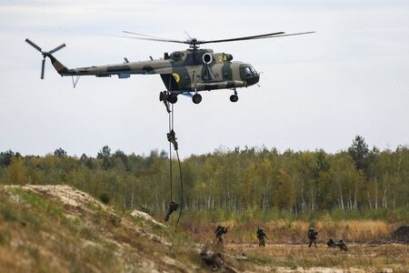 Helicopter of Ukrainian National Guard with servicemen during the tactical-special drills of the...