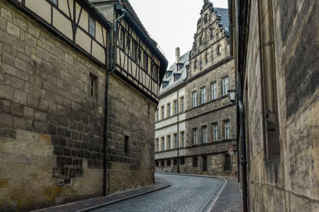Narrow medieval street with traditional Bavarian houses in Bamberg, Bavaria, Franconia, Germany. November 2014. High quality photoの写真素材