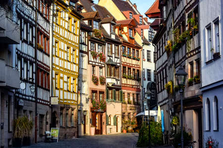 Old fachwerk half-timbered houses on Weissgerbergasse street in the historical center of Nuremberg, Germany. October 2014. High quality photoの写真素材