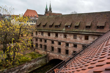 Top view to the Kreuzigungshof or court of crucifixion of the historical Heilig-Geist-Spital Holy Spirit Hospital near the Pegnitz river in the old town of Nuremberg, Bavaria, Germany. November 2014の写真素材