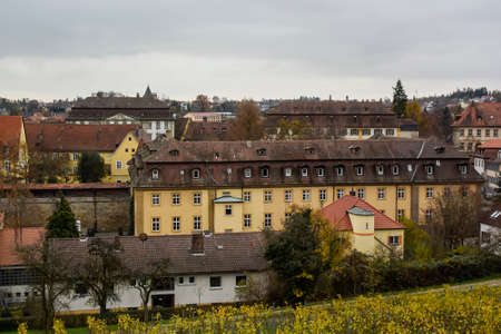 View of traditional houses with typical red tiled rooftops in Bamberg, Bavaria, Franconia, Germany. November 2014. High quality photoの写真素材