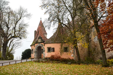 View on medieval castle gate from park Burggarten in old town Rothenburg ob der Tauber, Bavaria, Germany. November 2014. High quality photoの写真素材