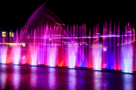 Evening view to Musical fountain with laser animations Roshen on the Southern Buh river in Vinnytsia, Ukraine. September 01, 2020. High quality photoの写真素材