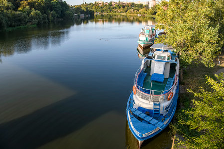 Parking lot of tourist boats on the Southern Bug River in Vinnytsia, Ukraine. September 2020. High quality photoの写真素材
