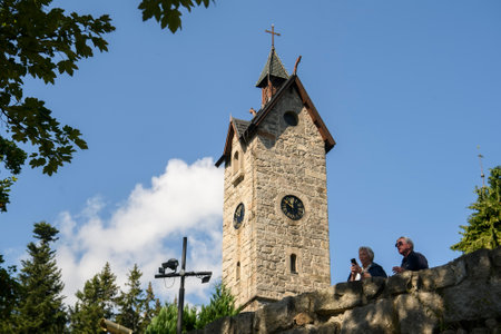 Medieval Norwegian stave wooden church Vang or Wang, which was transferred from Vang in Norway to Karpacz. Old cemetery in front of. in Karpacz, Poland, September 2021. High quality photoの写真素材