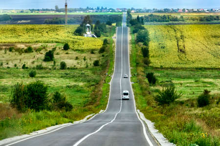 Empty asphalt road motorway in the hilly countryside in Ukraine. High quality photo