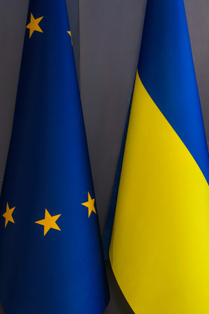 The national flag of Ukraine and the flag of the European Union in Kyiv. High quality photo
