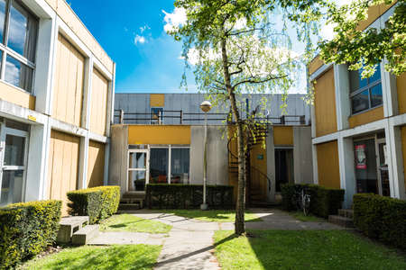 Auderghem, Brussels/ Belgium - 05 02 2018: Prefab colorful studenthouses and students at the campus of the Free University of Brusselsのeditorial素材