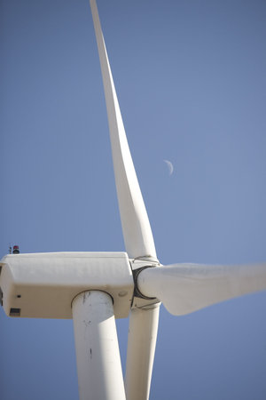 wind generator detail with moon in the background