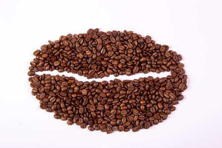 Coffee beans on a light background. Roasted coffee.の写真素材