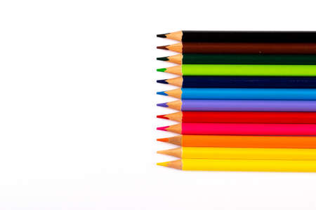 Stacked colored pencils on a light background. Side view.の写真素材