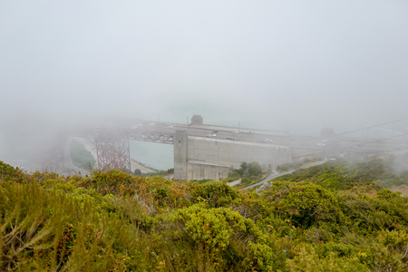 view of golden gate bridge in a foggy day from battery Spencer.の写真素材