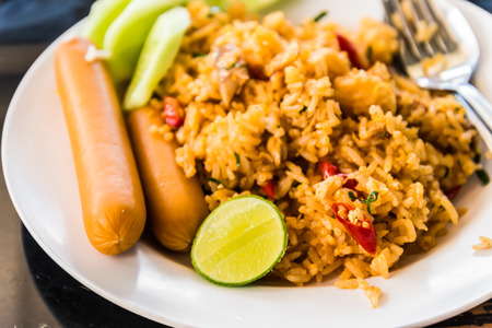A popular meal "Fried Rice" served with  a piece of lemon.の写真素材