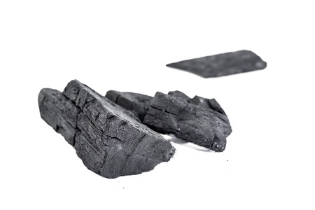 many pieces of charcoal isolated on white backgroundの写真素材