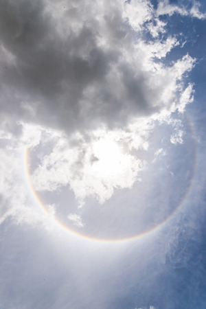 Corona on blue sky, the sun with the ring.の写真素材