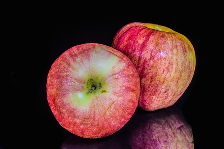 Fresh apples isolated on black background,Good for healthyの写真素材
