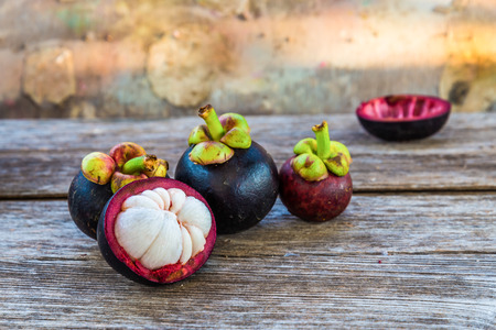 Mangosteen on wooden.の写真素材