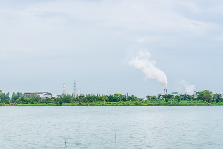 chimney with white dense smokeの写真素材