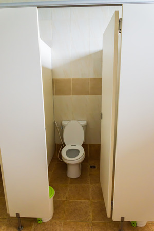 Toilet closeup in a building interiorの写真素材