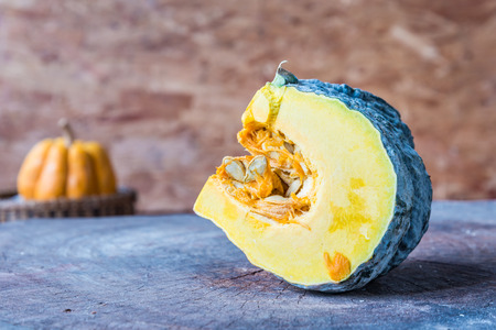 pumpkin on wood backgroundの写真素材