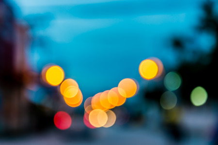 Photo of bokeh lights on blue backgroundの写真素材