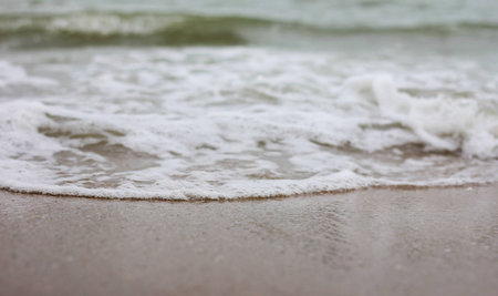 Wave on beach close-up