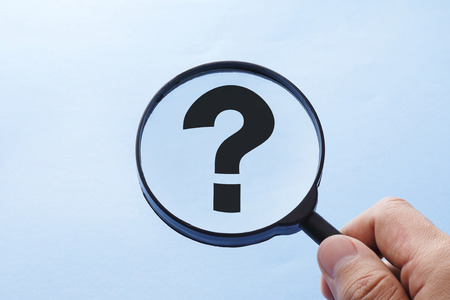 Question mark and magnifying glassの写真素材