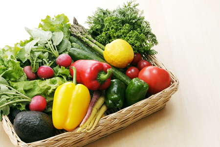 Set of different vegetables in wicker basketの写真素材