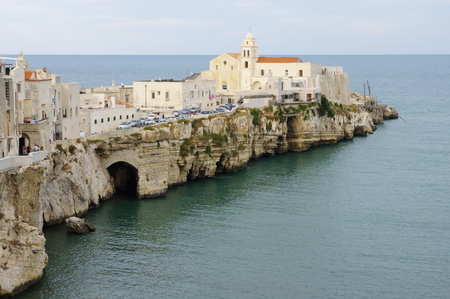 Vieste, Italy - September 09, 2015: center of the historic town on the Gargano Peninsula in the province of Foggia. In the image are visible medieval town center with the church of St. Francis on the promontory.のeditorial素材