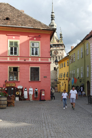 Sighisoara, Transylvania, Romania â September 12, 2017: the streets of the old town located inside the defensive walls. In the yellow tenement house was born in 1431 Vlad Tepes, a cruel ruler. He became the inspiration for the legend of Count Dracula - のeditorial素材