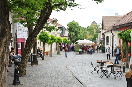 Szentendre, Hungary â May 17, 2018: small town near Budapest, capitol of Hungary. Dumtsa Jeno street. You can see shops, pubs and restaurants. Some tourists are walking on the street.のeditorial素材