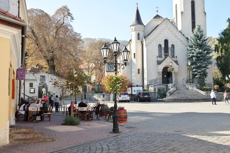 Tokaj, Hungary - October 16, 2018: Kossuth Ter, square in the center of the city. View of the Heart of Jesus Church.のeditorial素材
