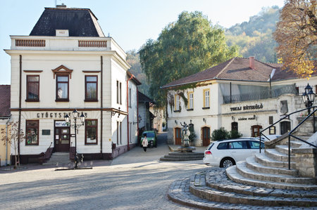 Tokaj, Hungary - October 16, 2018: Ovar street in the center of the city. On the right, in the...