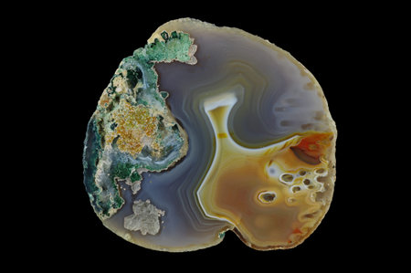 Iridescent agate with inclusions. Colorful ribbons colored with metal oxides are visible. Origin:...